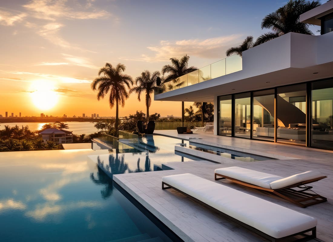 Private Client Insurance - Luxury Single Story Home with a Pool and Palm Trees in Florida During the Sunset